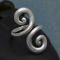 Luxe Silver Plate Double Swirl Adjustable Ring on blue background