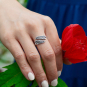 Luxe Silver Plate Adjustable Sprig Leaf Ring  on hand holding flower
