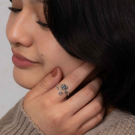 Luxe Silver Plate Adjustable Lotus Ring on hand