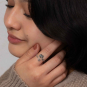Luxe Silver Plate Adjustable Lotus Ring on hand