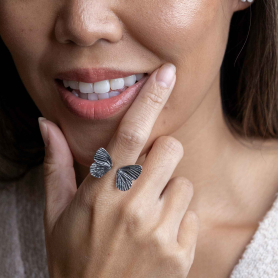 Luxe Silver Plate Adjustable Dimensional Butterfly Wing Ring on hand