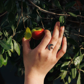 Luxe Silver Plate Adjustable Moon Phase Ring on hand