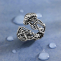 Luxe Silver Plate Adjustable Jellyfish Ring on blue background