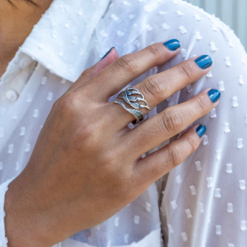 Luxe Silver Plate Adjustable Kelp Ring on hand