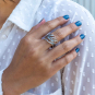 Luxe Silver Plate Adjustable Kelp Ring on hand