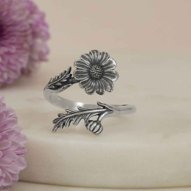 Silver Plate Adjustable Daisy Ring on cream background