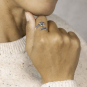 Silver Plate Adjustable Daisy Ring on hand