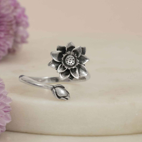 Silver Plate Adjustable Waterlily Ring on cream background