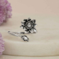 Silver Plate Adjustable Waterlily Ring on cream background