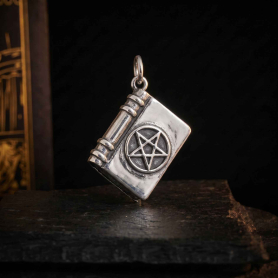 Luxe Silver Plate Pentagram Spell Book Charm on dark background