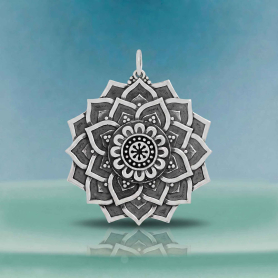 Luxe Silver Plate Lotus Mandala Pendant on blue background