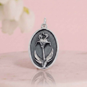 Luxe Silver Plate Iris Charm on pink background