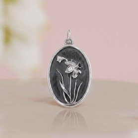 Luxe Silver Plate Daffodil Charm on pink background