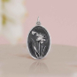 Luxe Silver Plate Daffodil Charm on pink background