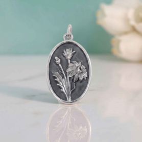 Luxe Silver Plate Daisy Charm on blue background