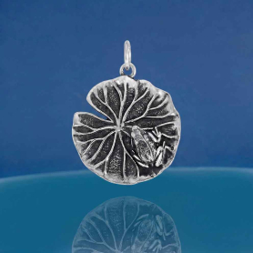 Luxe Silver Plate Frog on Lilypad Charm on blue background