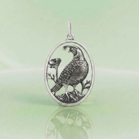 Luxe Silver Plate Quail Charm on green background
