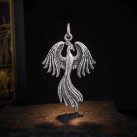 Luxe Silver Plate Phoenix Charm 32x19mm on dark background