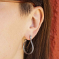Luxe Silver Plate Textured Snake Hoop Earrings on ear