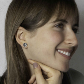 Luxe Silver Plate Poppy Flower Post Earrings on model