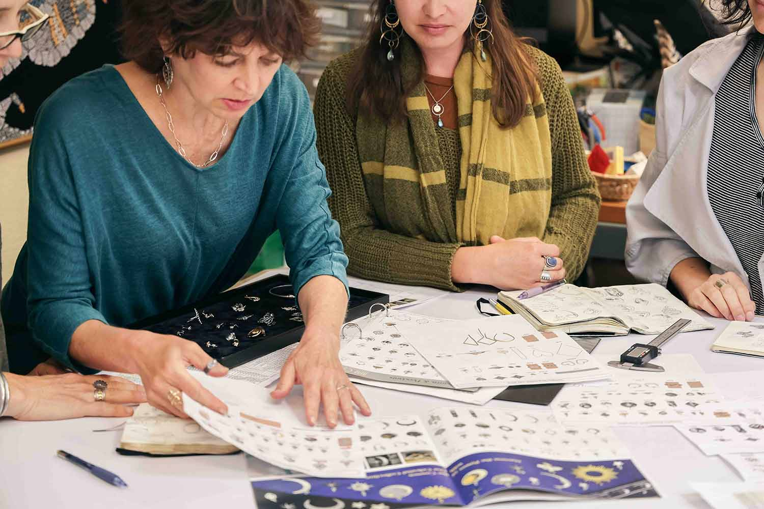 Design Team Reviewing Sketches