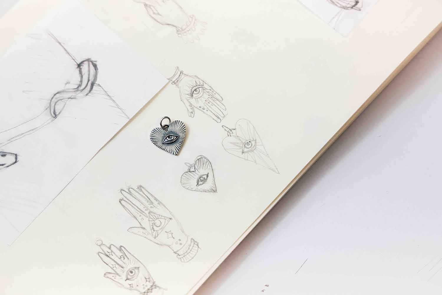 Heart Charm showed with original sketches