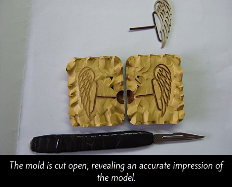 Mold with wing charm