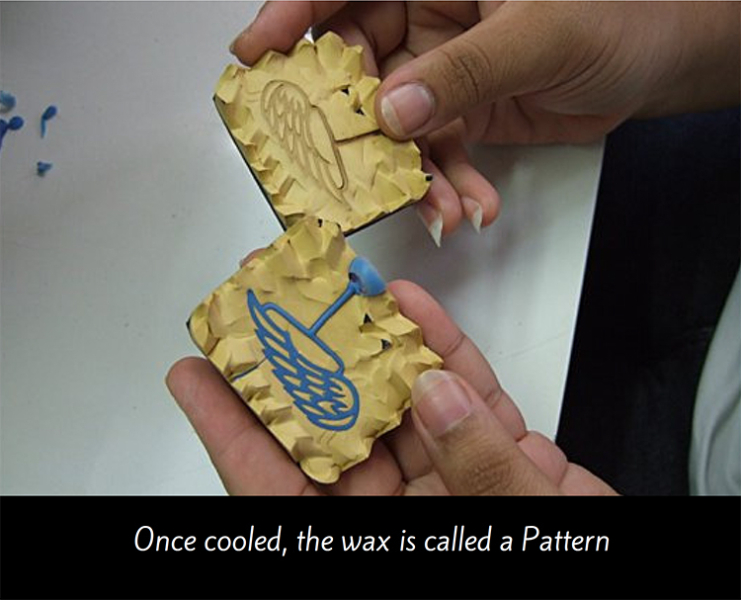 Wax Wing Charm in mold