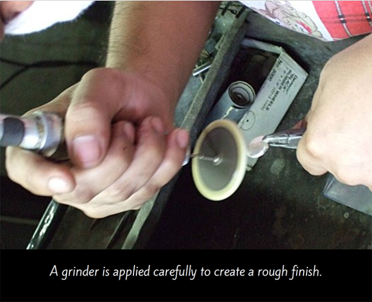 Polishing charms on wheel