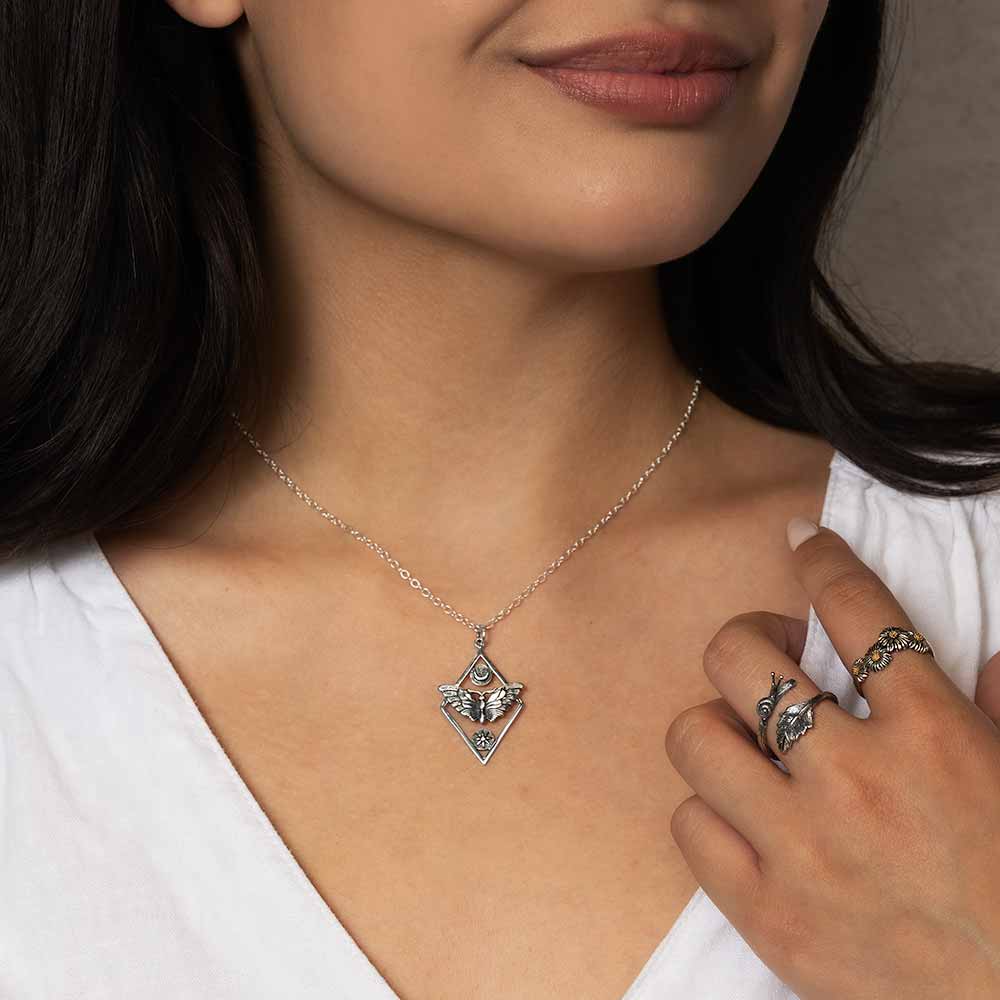 Women wearing silver jewelry