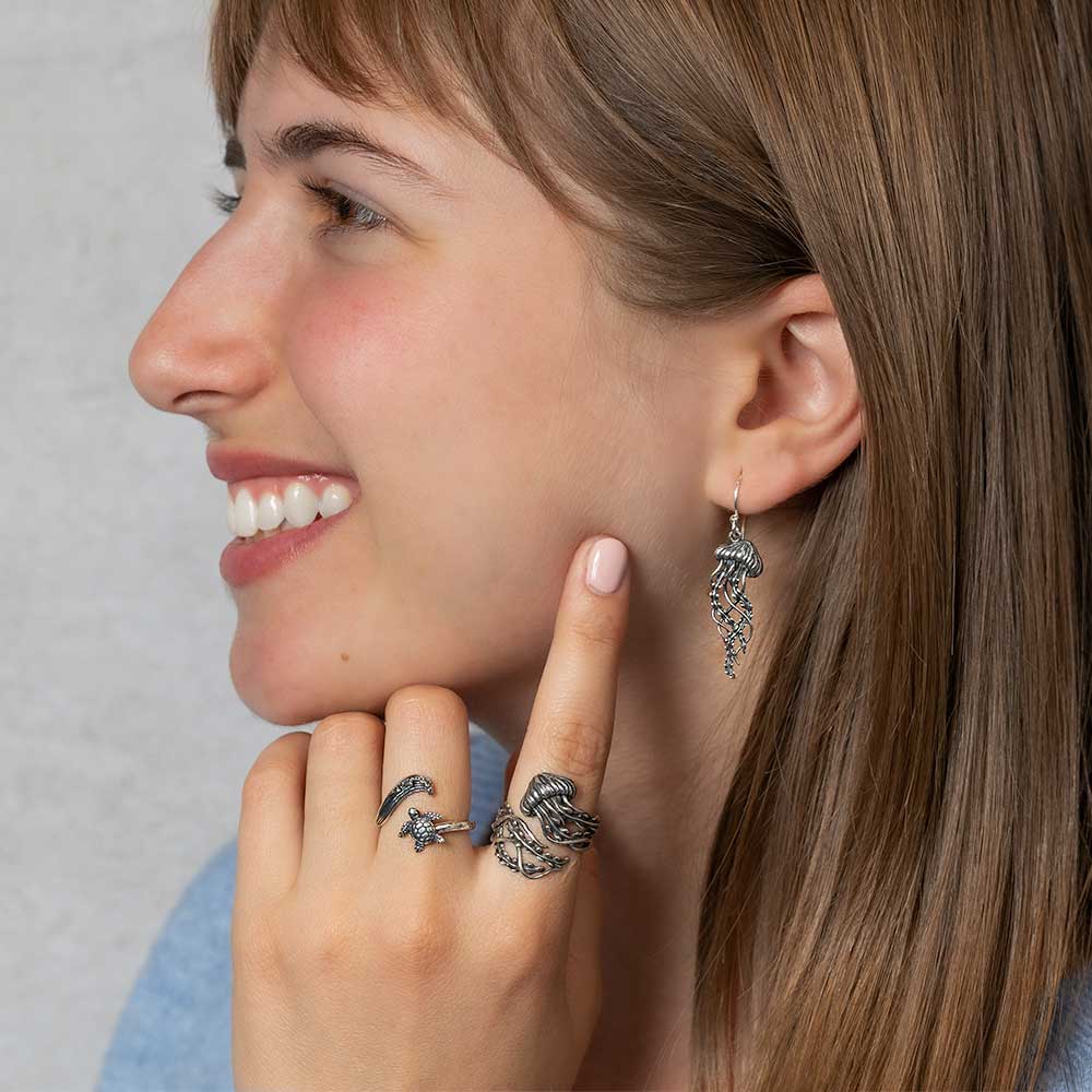 Women wearing silver jewelry