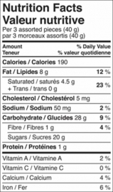 WB OCCASIONS CHOC ASST TIN 600G X 12