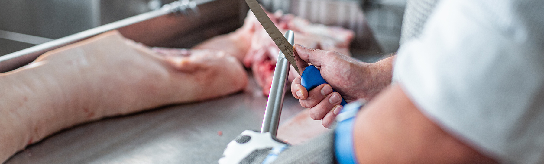 Image of an FDick sharpening steel in action