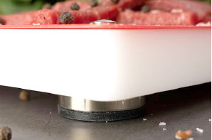 Corner view showing stainless steel slip-resistant foot on bottom of board