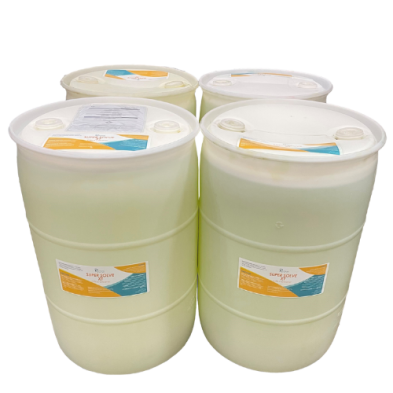 A group of four industrial barrels. They are white with orange and blue labels.