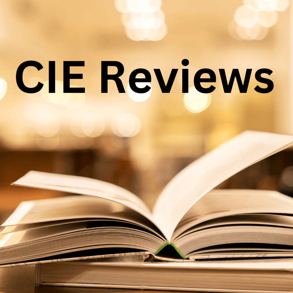 An open book resting on top of another book. Above the books are the words” CIE Review.”