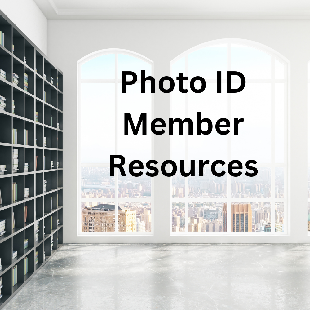 Large bowed windows with a bookcase on the left-hand side. The words “Photo ID Member Resources” to the right of the bookcase.