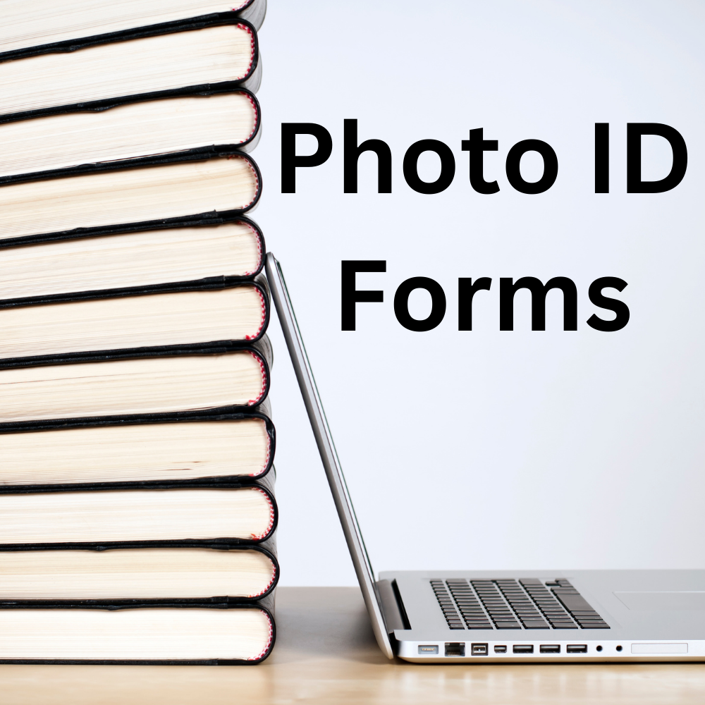 Books stacked on top of each other. To their right is an open laptop and the words “Photo ID Forms.”