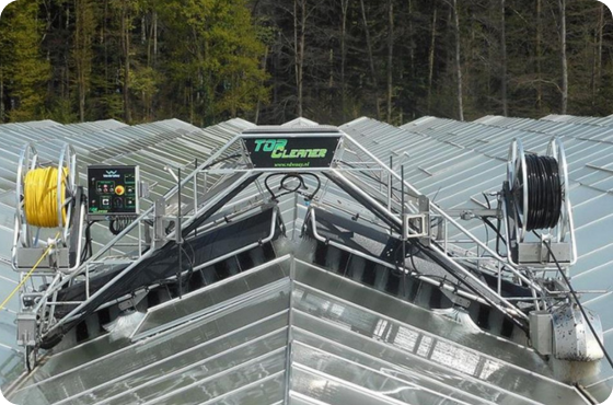 top cleaner on a greenhouse